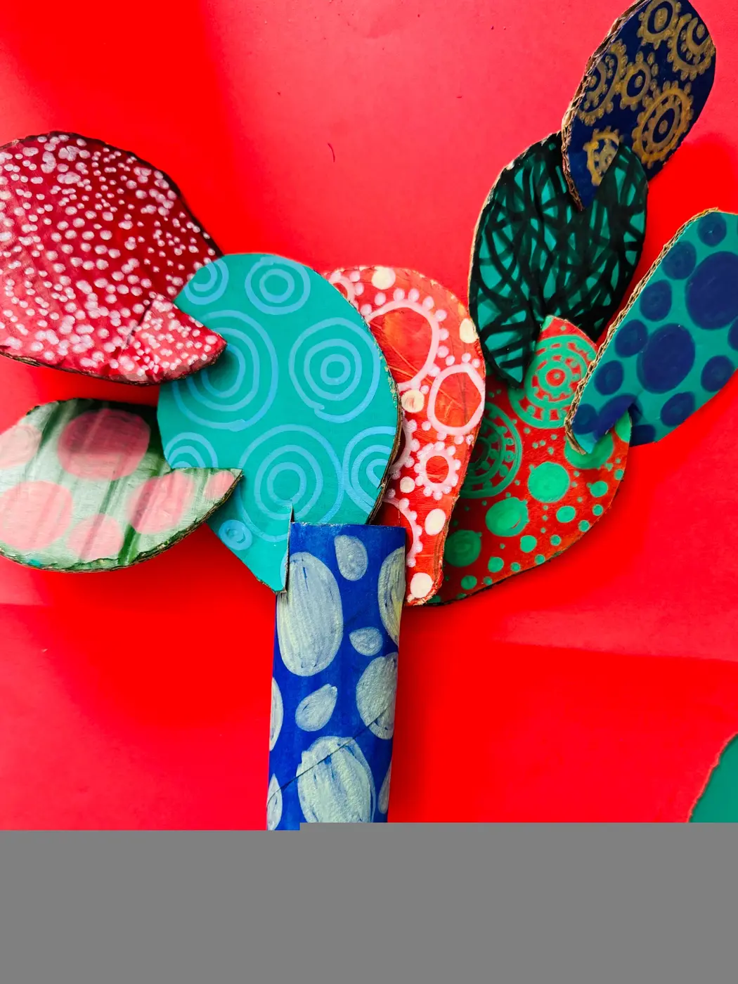 Bright patterned cardboard tree artwork