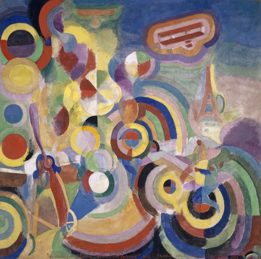 Whirling discs of red, yellow, blue and green fill the whole canvas. A propeller, a small aeroplane and the Eiffel Tower can be picked out among the circles.