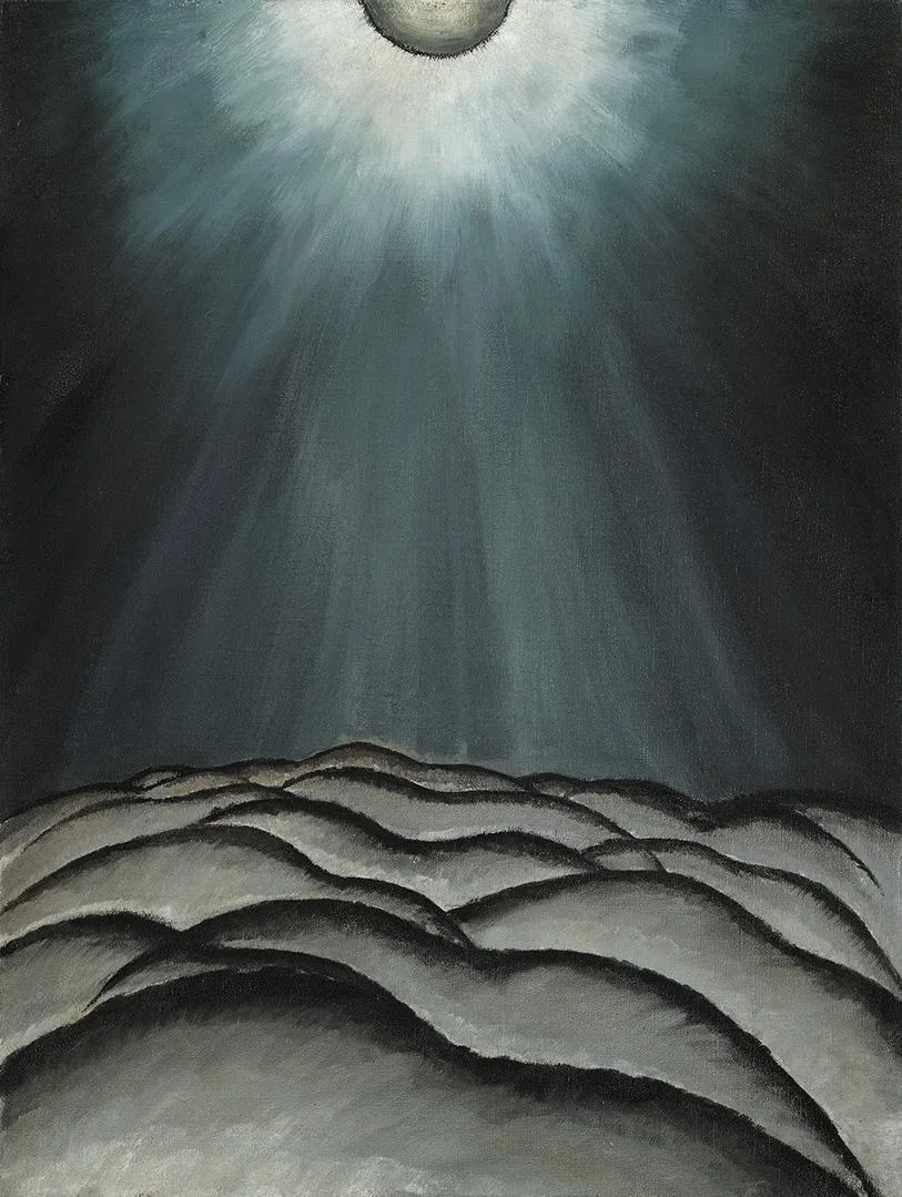 A pale moon burning through cloud above a sea that has been reduced to a few grey folds. Almost nothing is described, and it is unmistakably night on water.