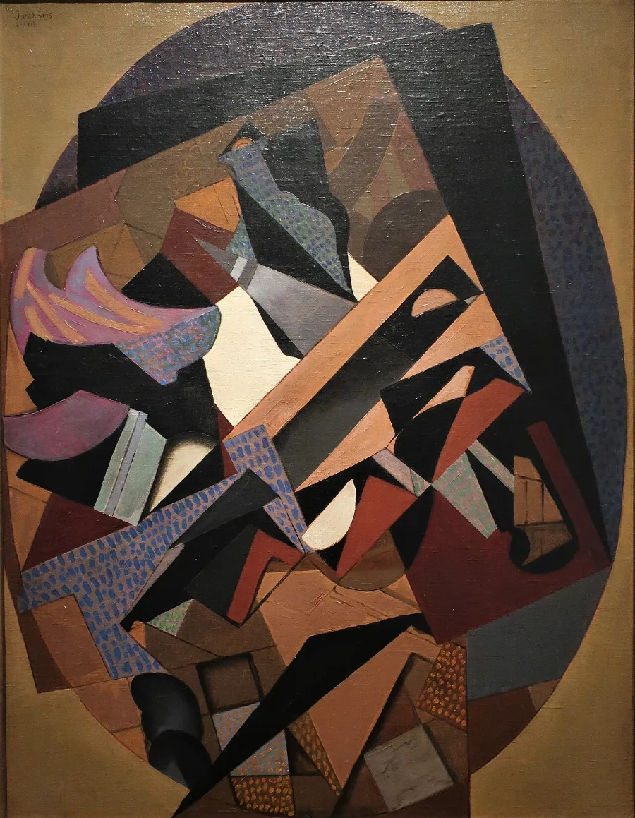 Flat angular shapes inside a dark oval. Some are plain, some are patterned like wallpaper, and they overlap exactly the way pieces of cut and pasted paper would.