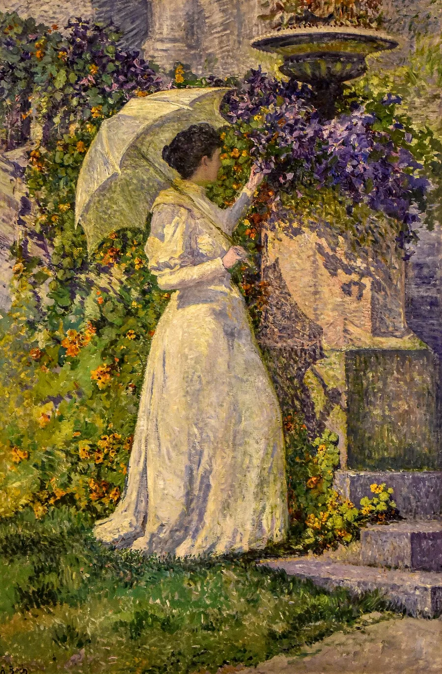 A woman in white with a parasol standing in a summer garden. The flowers, the wall behind her and her own dress are built from thousands of coloured specks.