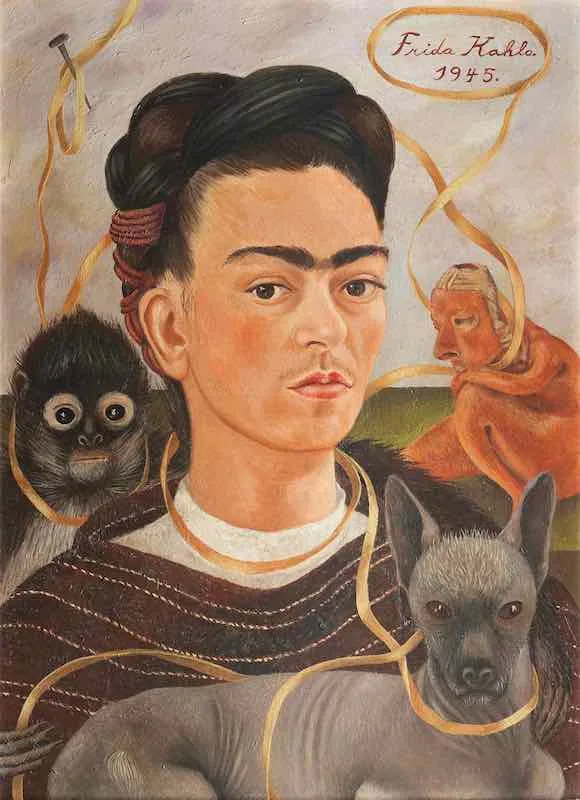 Frida Kahlo looks straight out at you. A small monkey sits on one shoulder and a hairless dog leans against her, and a yellow ribbon loops around all three of them.