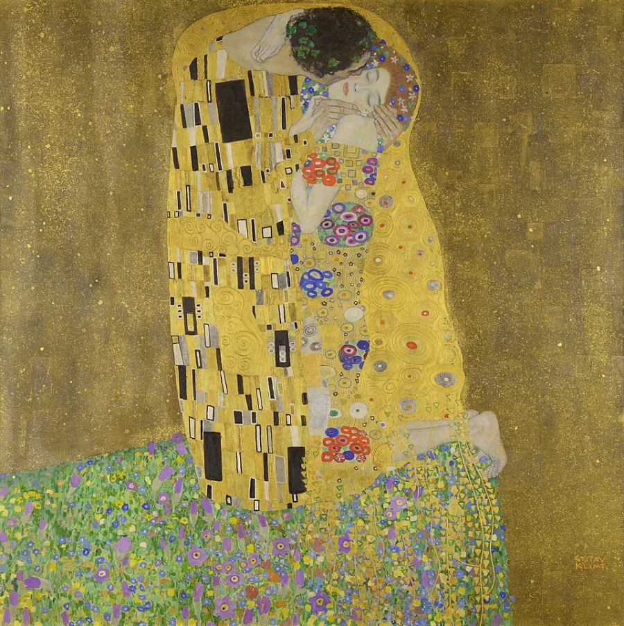 Two figures wrapped in a robe of gold pattern, kneeling in a field of flowers. The bodies are real; everything around them is ornament.