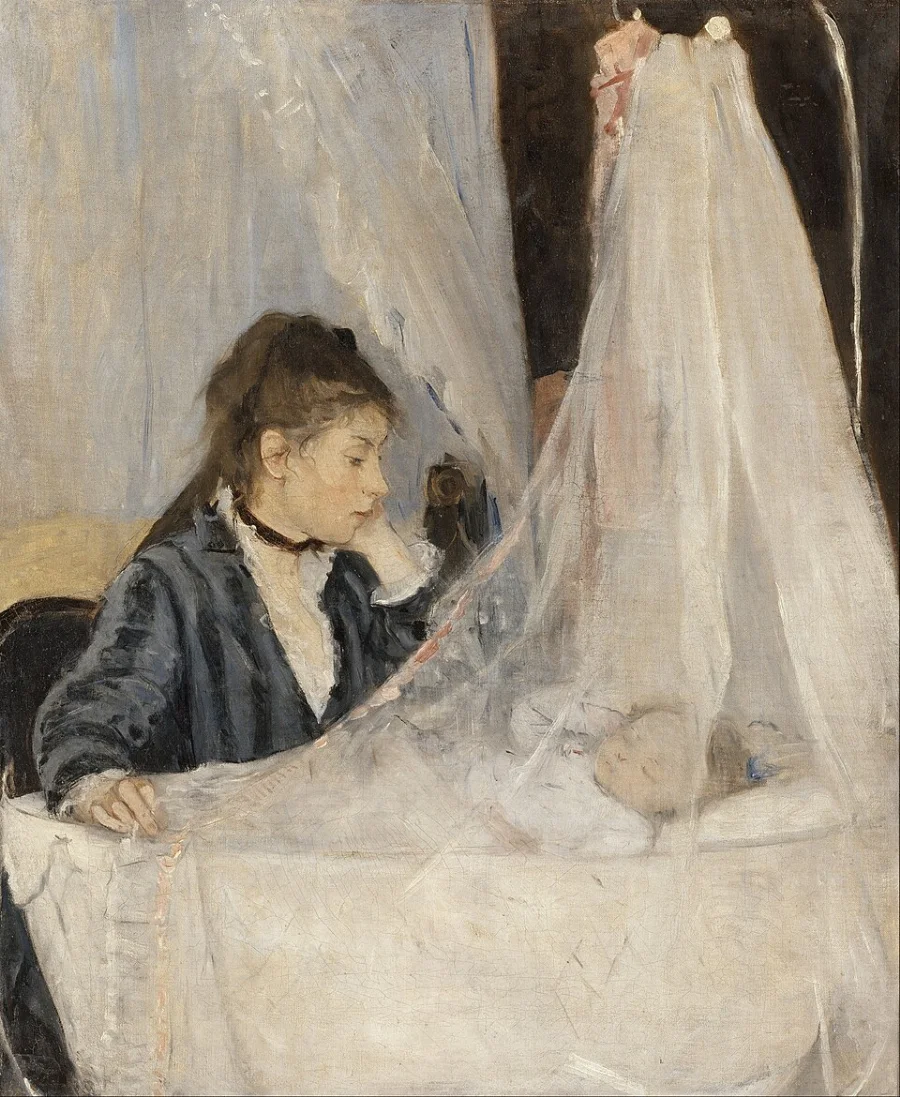 A young woman in a dark dress sits beside a cradle, one hand resting against her cheek, watching the sleeping baby through a white gauze veil.
